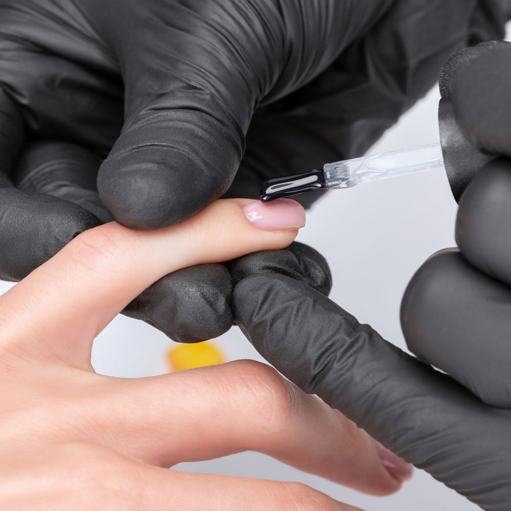 Beautifully enhanced nails with a glossy finish at Dagna Joanna in York.